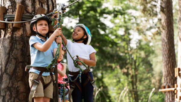 children having fun adventure park