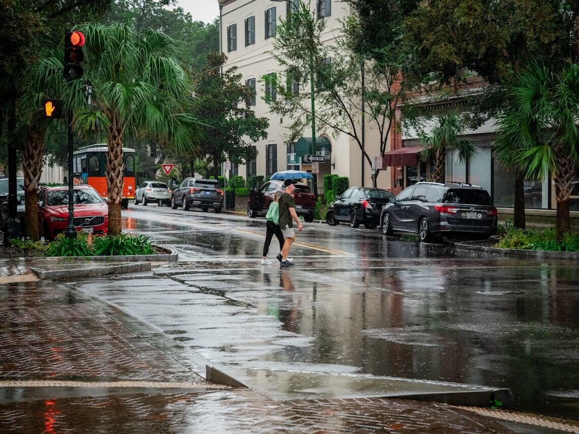 rainy day in savannah street scene with pedestrians