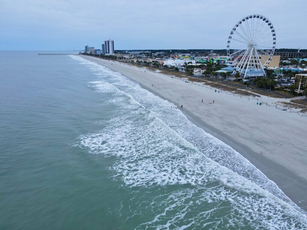 aerial view of the beach in front of the myrtle beach skywheel