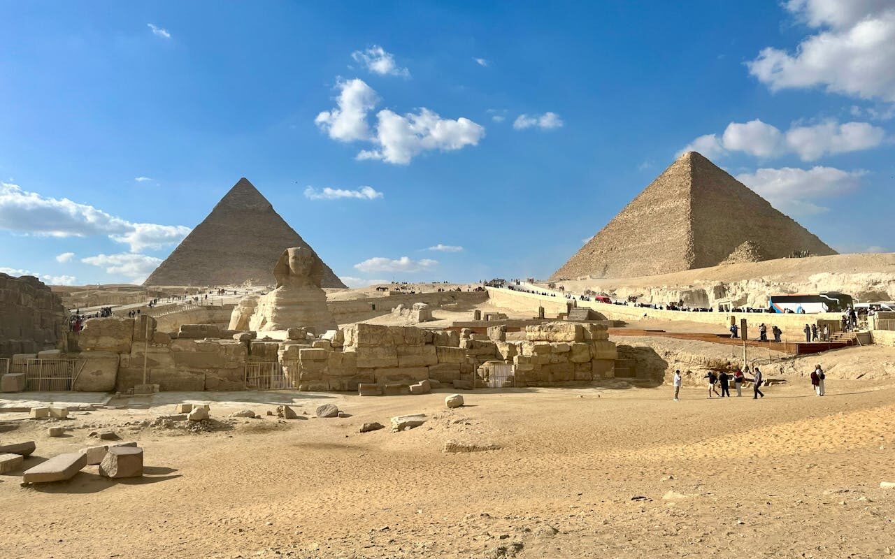 explore the majestic pyramids of giza and sphinx